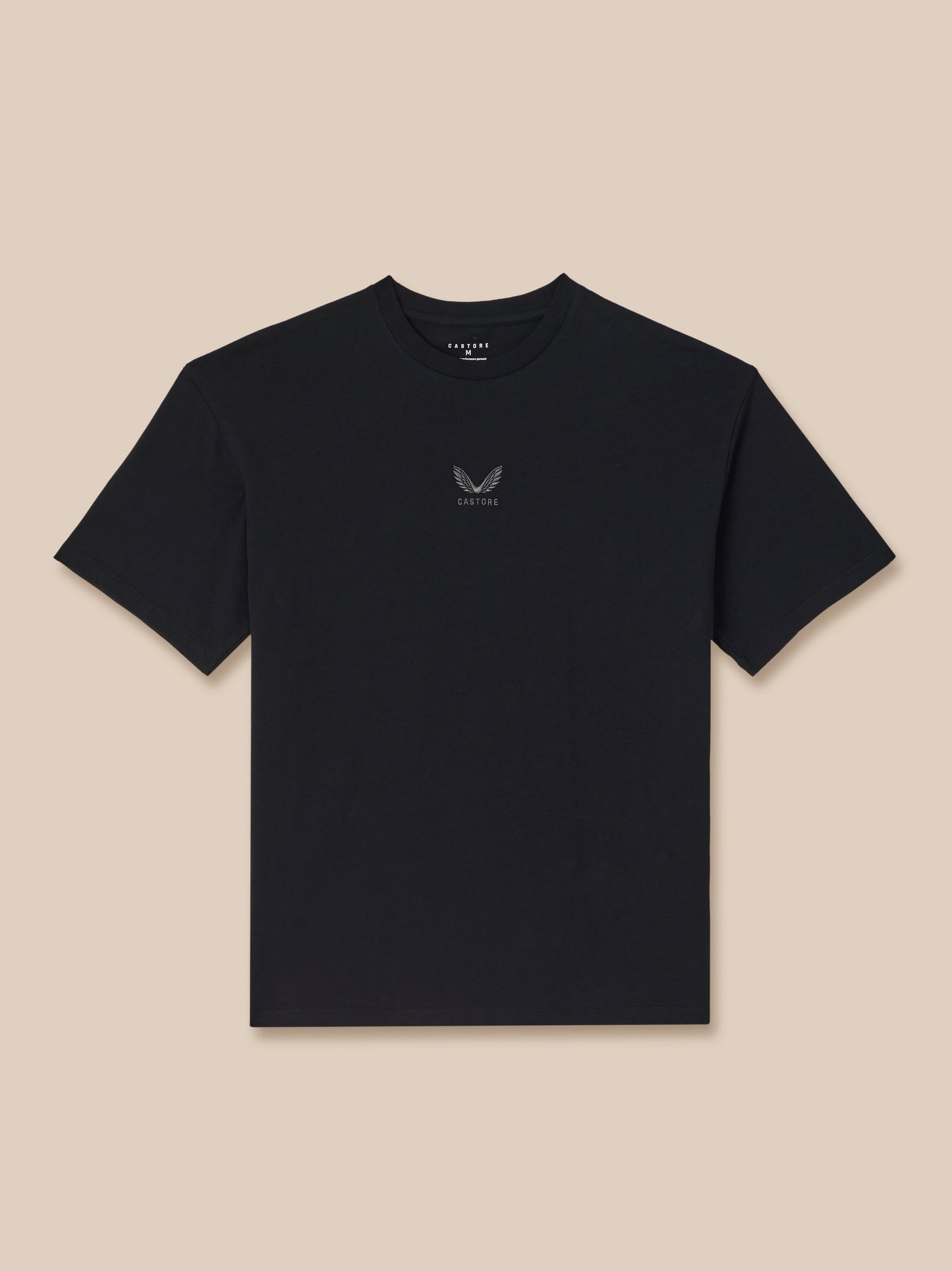 Black t-shirt with a small logo on a beige background