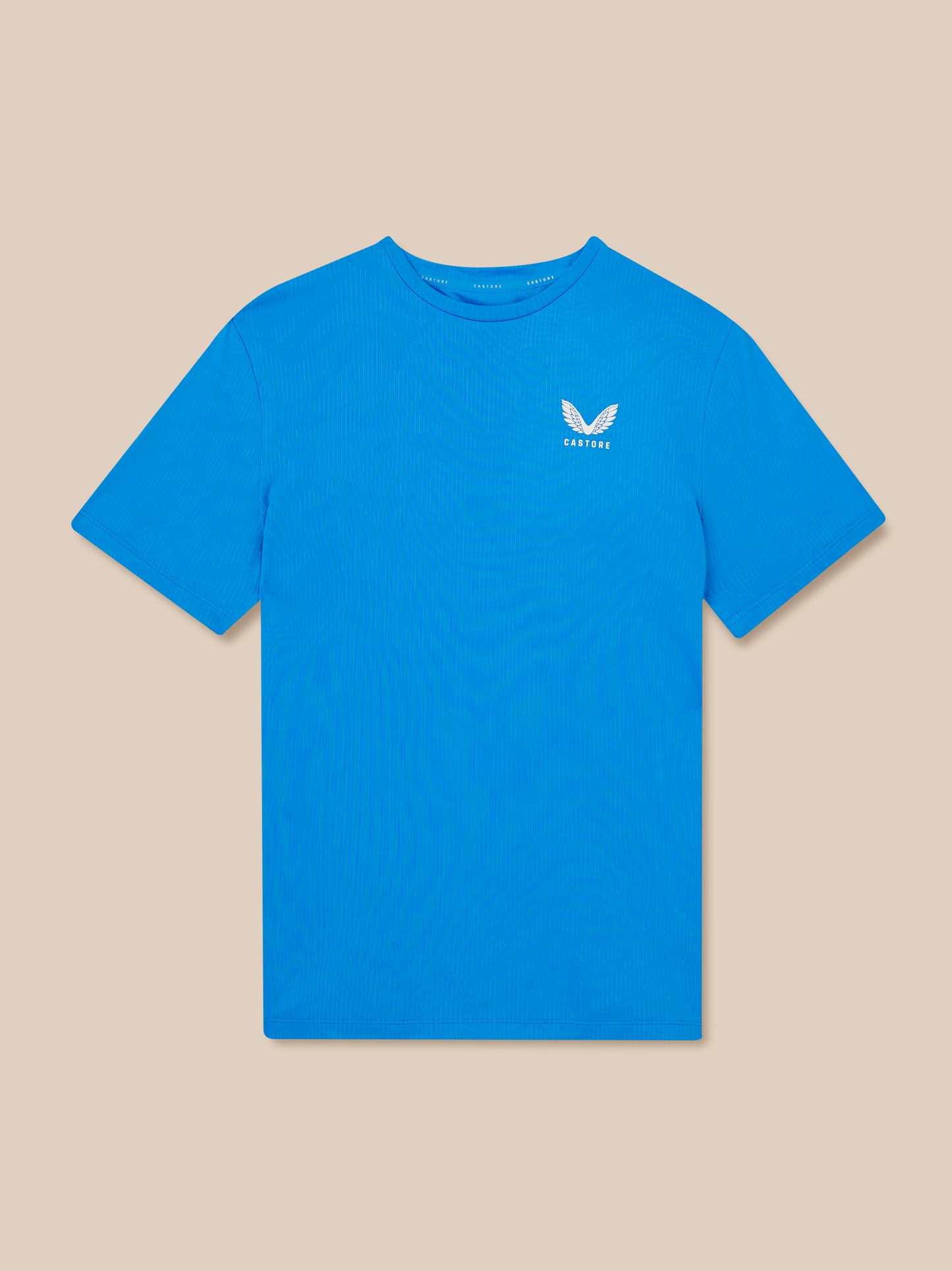 Blue t-shirt with a logo on a beige background