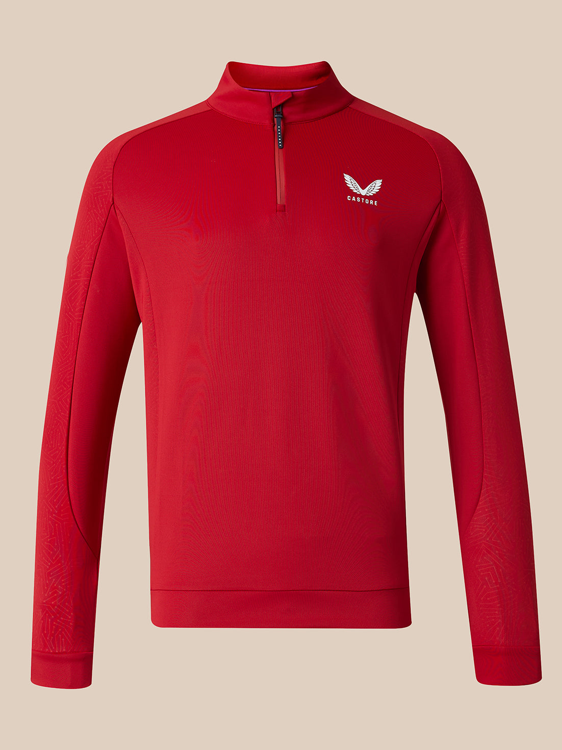 A red long-sleeve quarter-zip athletic pullover with a small white wing logo on the left chest, displayed on a neutral beige background.