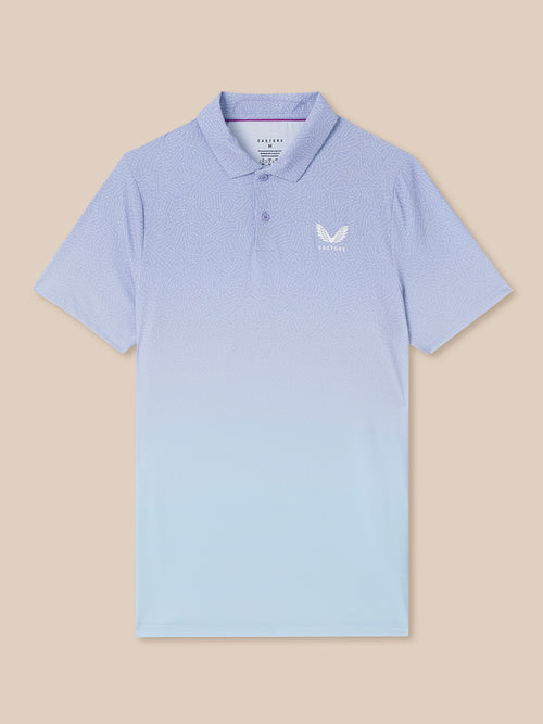 Lavender golf polo with a subtle map-like pattern and a white Castore logo on the chest