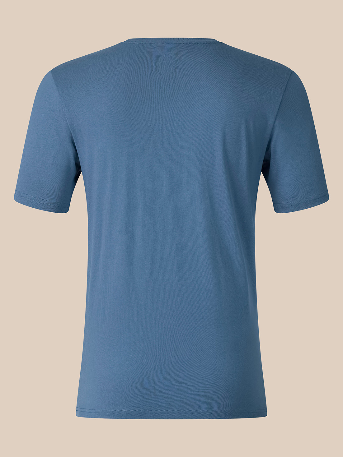 A short-sleeve crewneck t-shirt in a dusty slate blue color, shown from the back against a solid beige background.