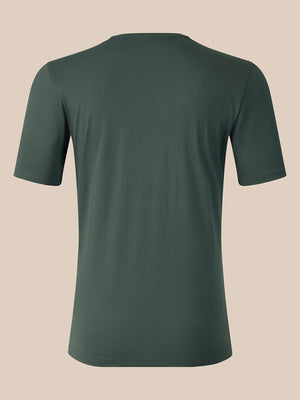 A dark green short-sleeve crewneck t-shirt shown from the back, displayed on a solid beige background.