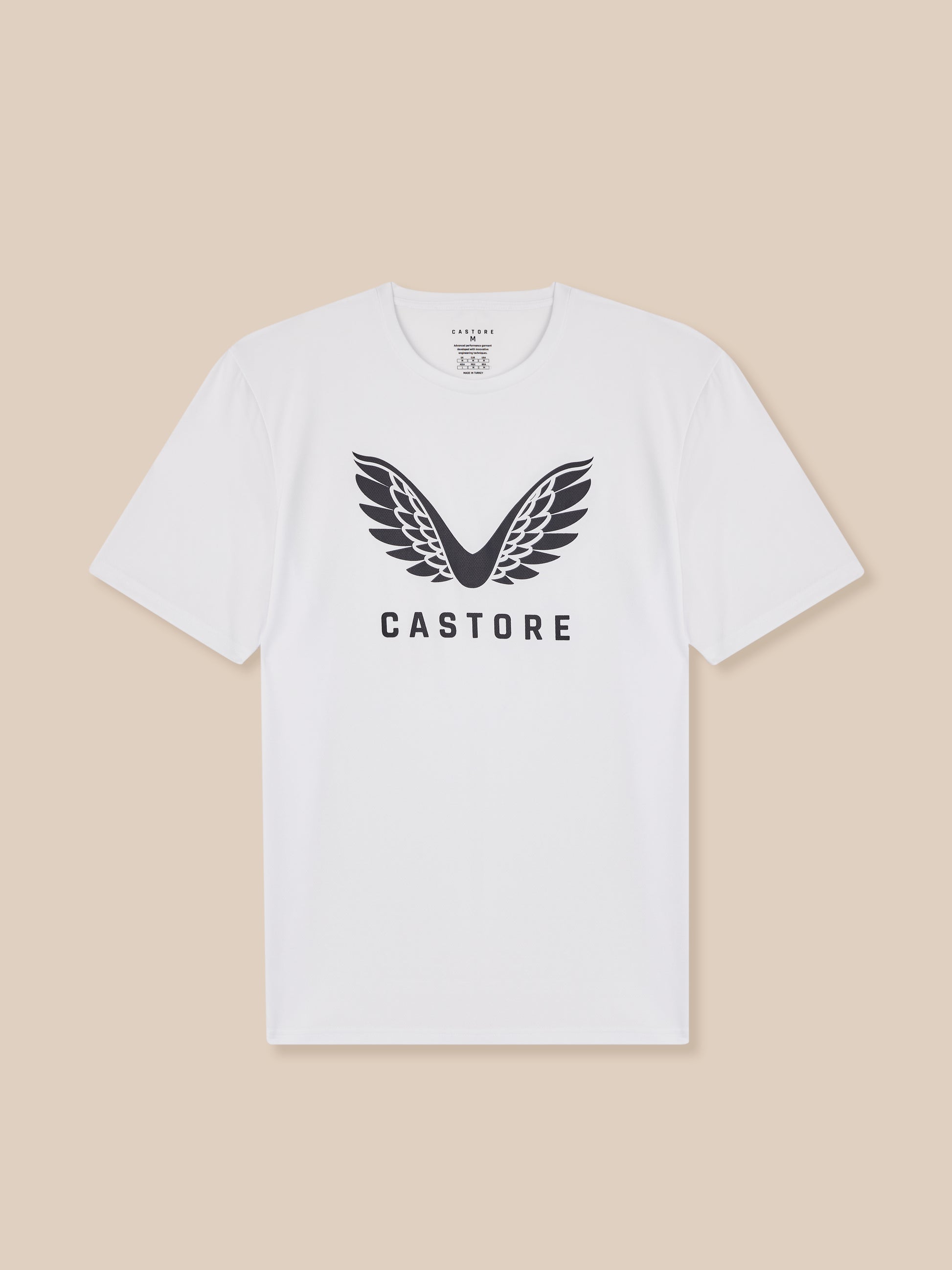White t-shirt with black logo and text on a beige background