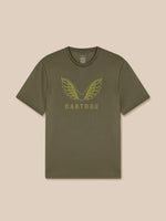 Green t-shirt with winged logo on a beige background