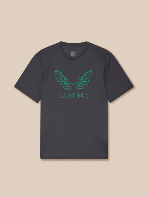 Black t-shirt with green logo and text on a beige background