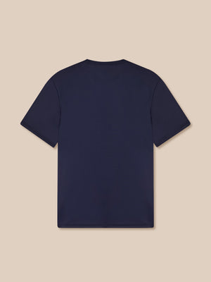 Navy blue t-shirt on a beige background