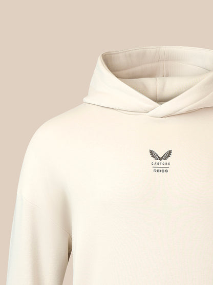 Stone oversized hoodie with chest logo showing wings and Castore Reiss branding