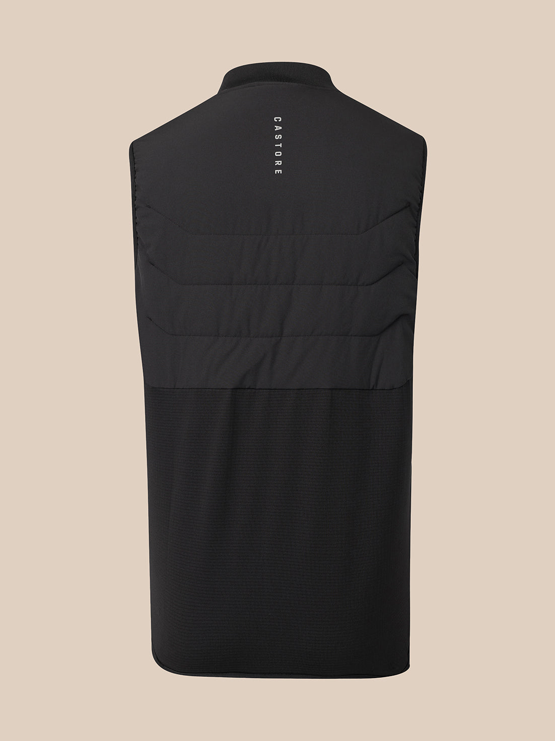 Black sleeveless quilted vest shown from the back, featuring horizontal quilting and a small vertical white 'CASTORE' logo near the collar, set against a solid beige background.
