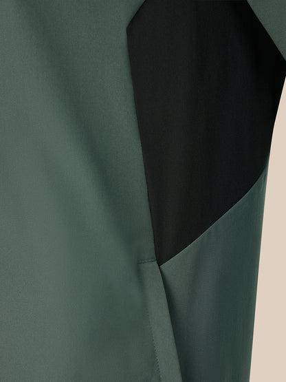 Dark green jacket on a beige background