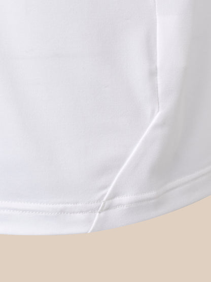 Close-up of a white fabric garment showing a curved hem with neat stitching against a light beige background.