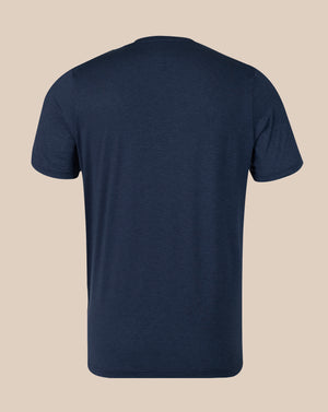 A navy blue short-sleeve crewneck t-shirt shown from the back, displayed on a solid beige background.