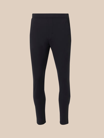 Front view of black slim fit trousers with an elastic pull-on waistband and tapered legs.