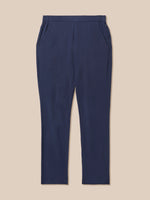 A pair of navy blue trousers with a flat front, side pockets, and a straight leg, displayed flat against a solid beige background.