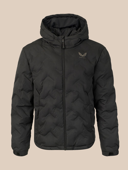 A black hooded puffer jacket with a full-zip front and a small gray wing logo on the left chest, displayed against a solid beige background.