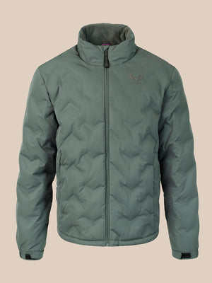 A sage green quilted puffer jacket with a stand-up collar and front zipper, featuring a small embroidered wing logo on the left chest, displayed against a solid beige background.