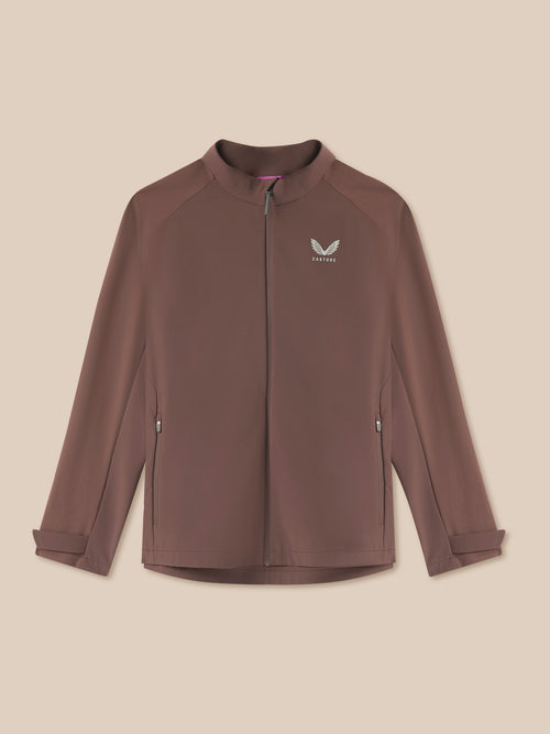 Brown jacket with a brand logo on a beige background