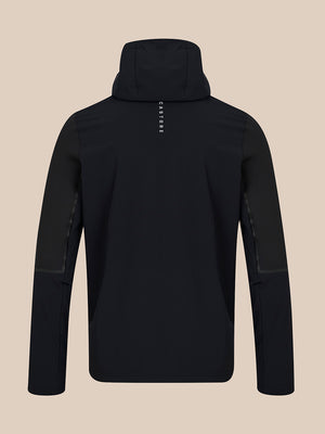 A black hooded jacket shown from the back, featuring a vertical white 'CASTORE' brand logo on the upper back, set against a solid beige background.