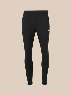 Black full-length leggings shown flat against a solid beige background.