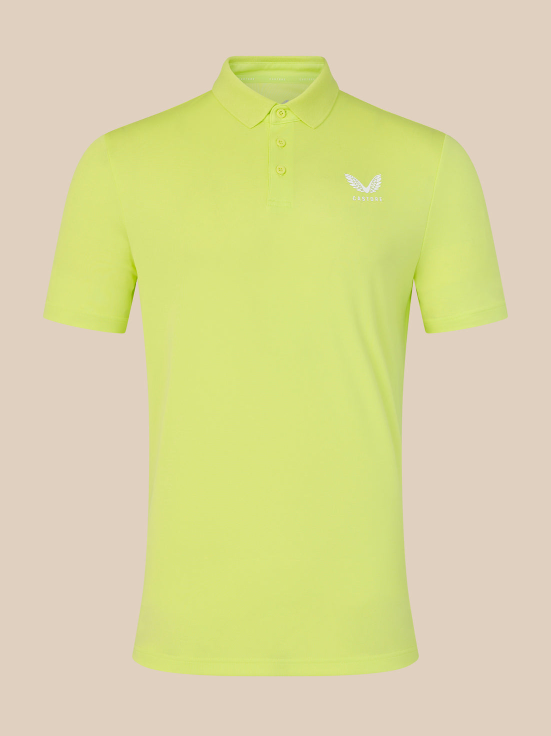 Yellow polo shirt with a logo on a beige background