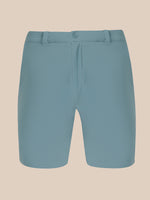 A pair of men's shorts in a muted slate blue color, shown flat against a solid beige background.