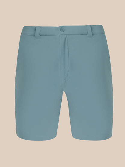 A pair of men's shorts in a muted slate blue color, shown flat against a solid beige background.