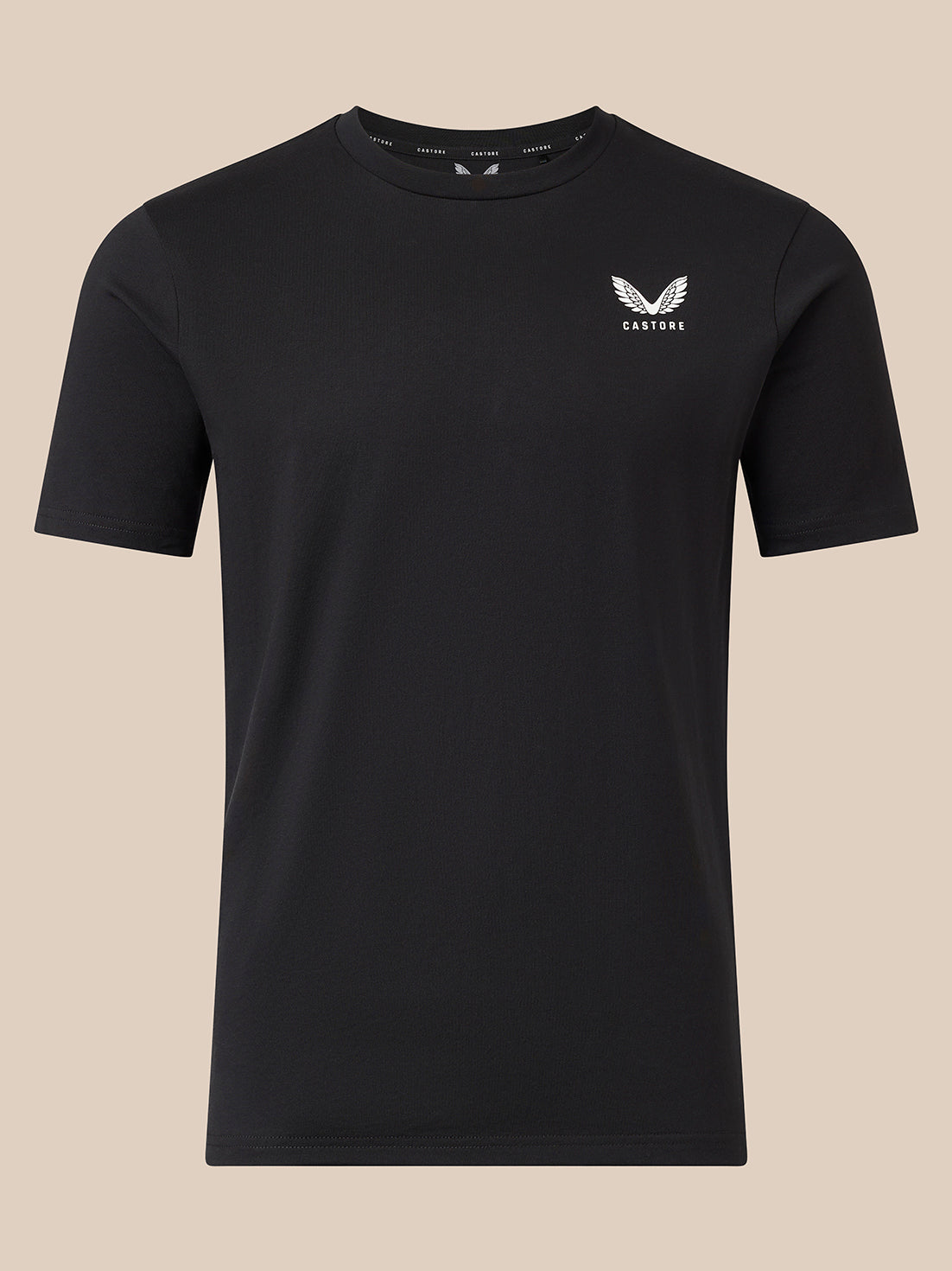 A black short-sleeve crewneck t-shirt with a small white winged logo and the word 'CASTORE' printed on the left chest, displayed against a solid beige background.