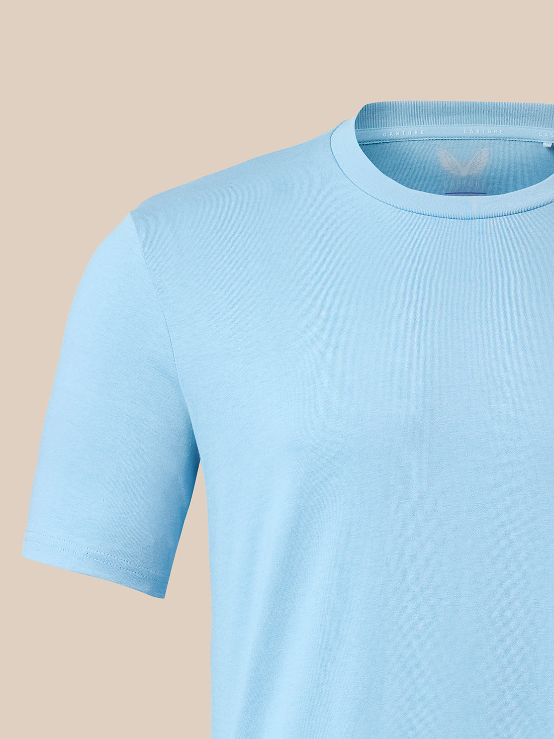 A light blue short-sleeve crewneck t-shirt shown on a mannequin torso against a solid beige background.