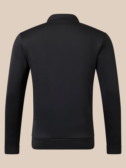 A black long-sleeve quarter-zip pullover jacket shown from the back, featuring a mock neck collar and ribbed cuffs and hem, set against a solid beige background.