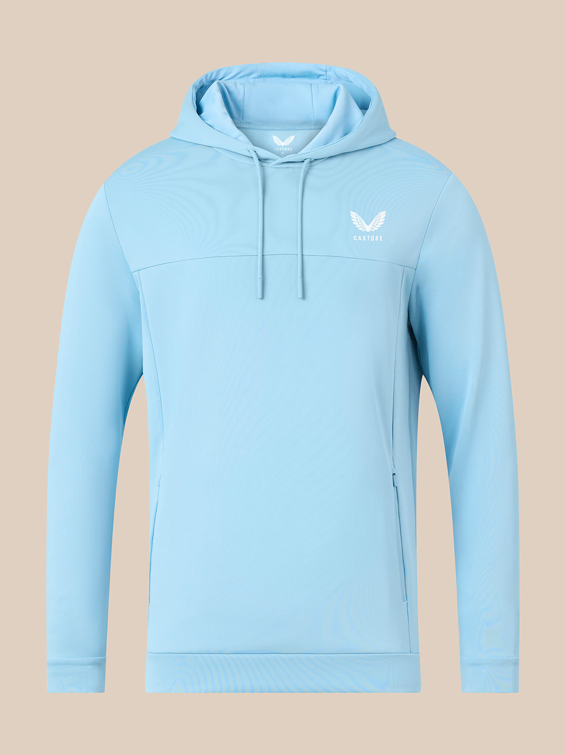 A light blue athletic pullover hoodie with a white winged logo on the left chest, displayed on a solid beige background.