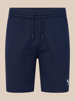 Navy blue shorts with a drawstring on a beige background