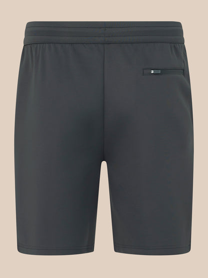 Dark gray shorts with a pocket on a beige background