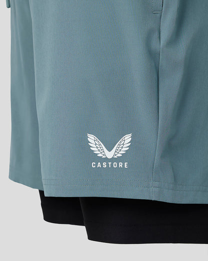 Gray shorts with a white logo on a light gray background