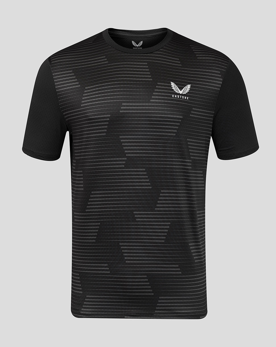 Front view of black men's all over print T shirt with geometric striped pattern and a small Castore logo on the chest