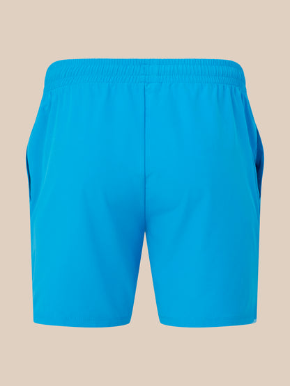 Blue shorts on a beige background