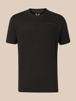 A black short-sleeve crewneck t-shirt with a small tonal 'CASTORE' logo on the left chest, displayed against a solid beige background.