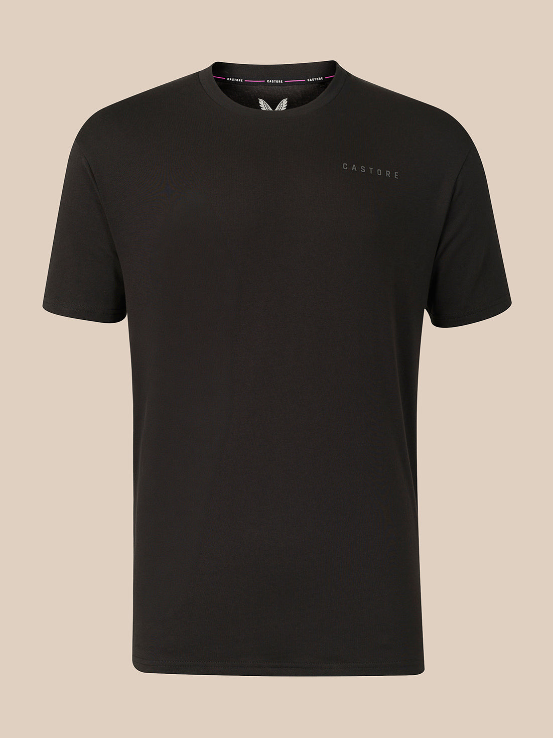 A black short-sleeve crewneck t-shirt with a small tonal 'CASTORE' logo on the left chest, displayed against a solid beige background.