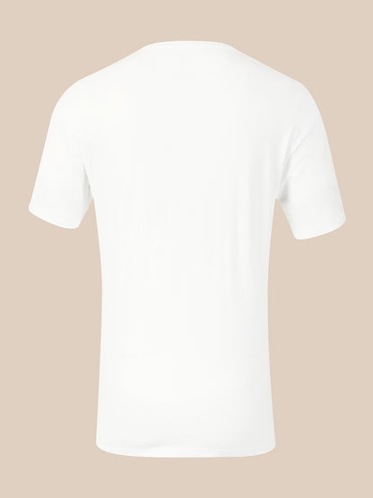 A plain white short-sleeve crewneck t-shirt shown from the back, centered against a solid light beige background.