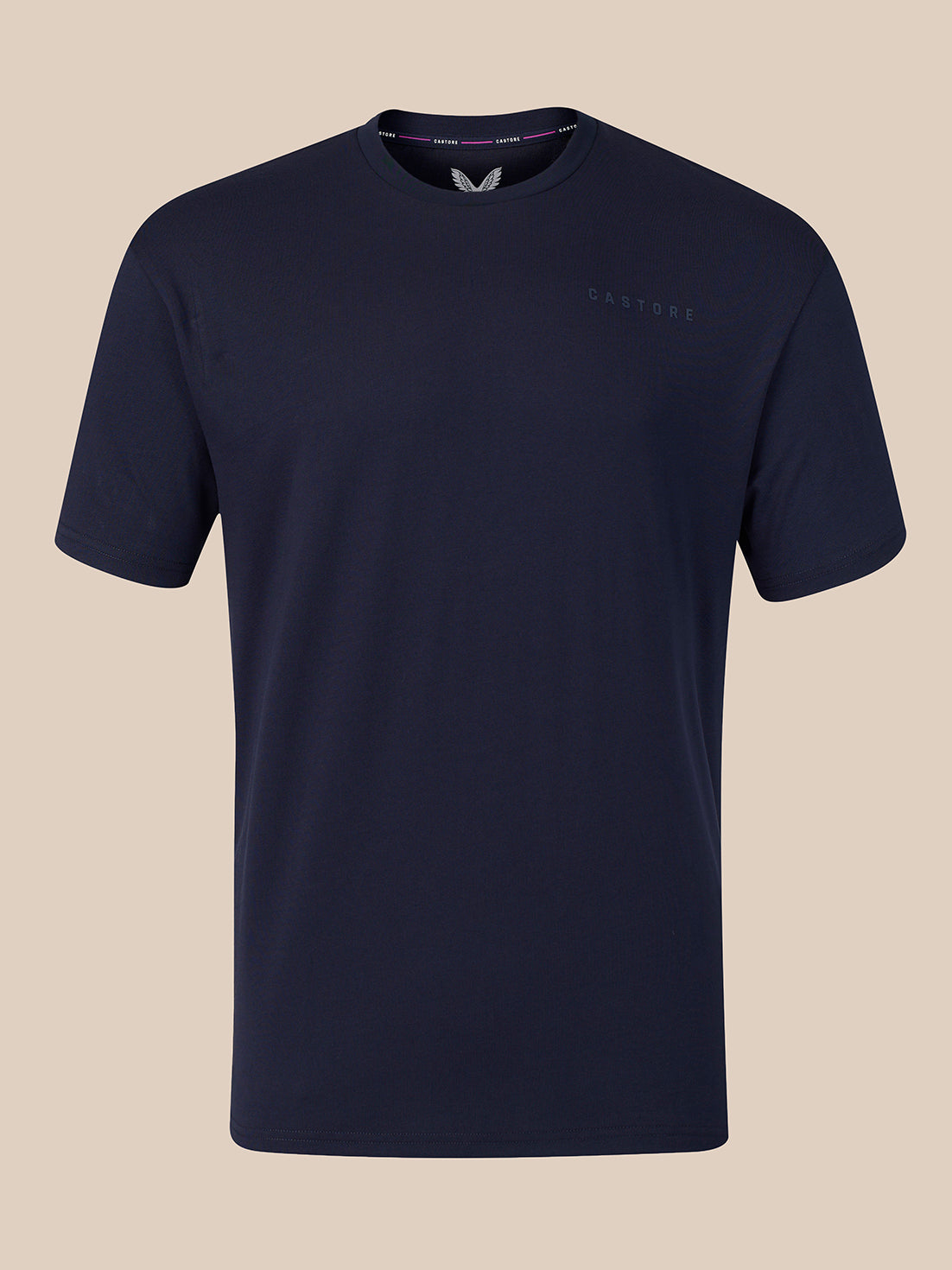 A dark navy blue crew-neck t-shirt with a subtle tonal embroidered logo on the left chest, displayed against a solid beige background.