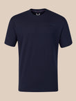 A dark navy blue crew-neck t-shirt with a subtle tonal embroidered logo on the left chest, displayed against a solid beige background.