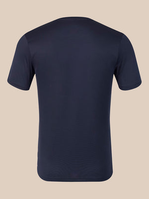 A dark navy blue short-sleeve crewneck t-shirt shown from the back, displayed on a solid beige background.
