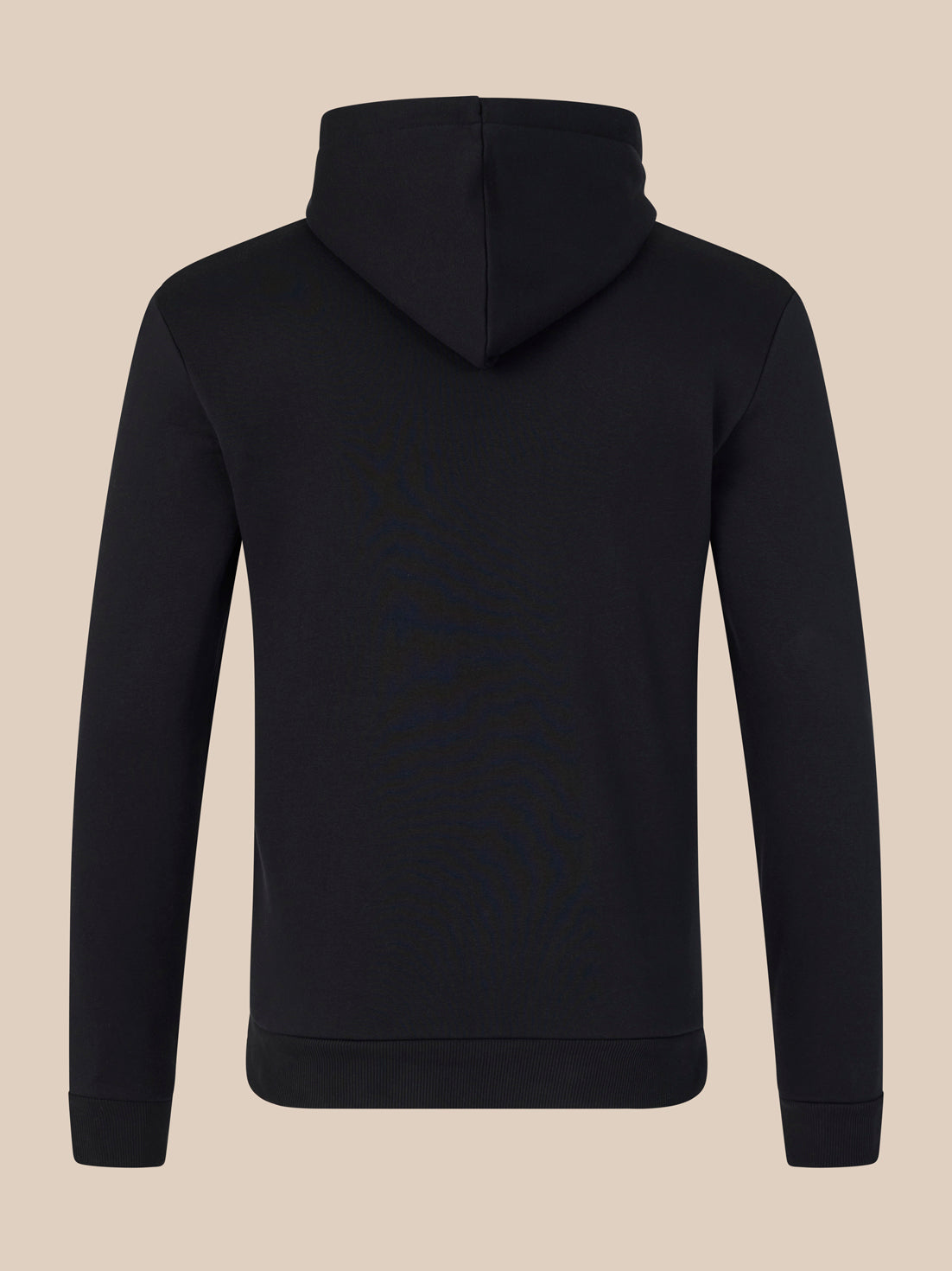 Black hoodie on a beige background