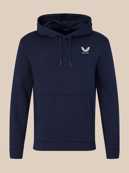 Navy blue hoodie with a white logo on a beige background