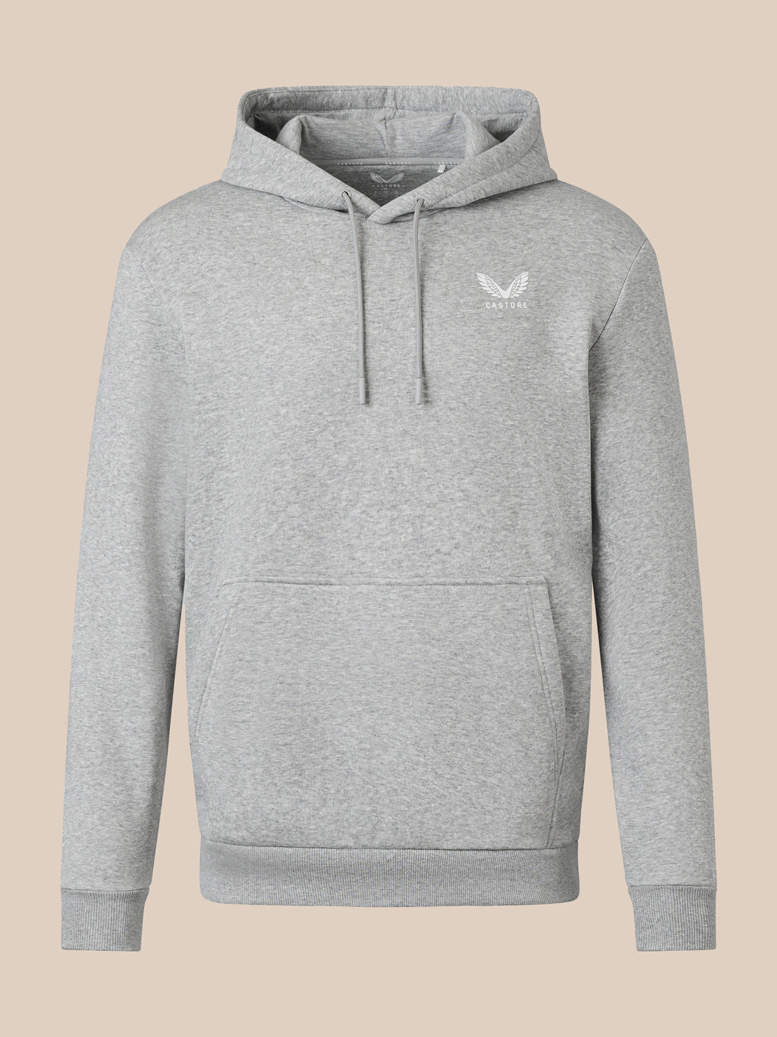 A light heather gray pullover hoodie with a small white embroidered winged logo on the left chest, displayed against a solid beige background.