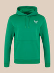 Green hoodie with a logo on a beige background