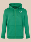 Green hoodie with a logo on a beige background