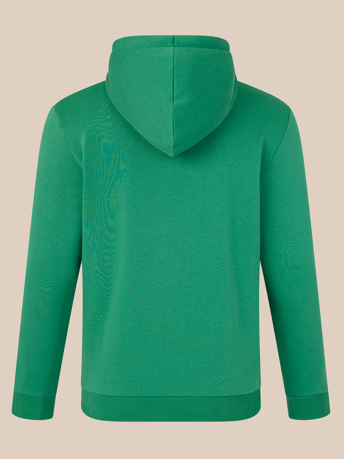 Green hoodie on a beige background