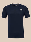 A dark navy blue short-sleeve athletic t-shirt with a white winged logo and the brand name 'CASTORE' printed on the left chest, displayed against a solid beige background.
