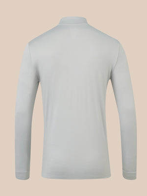 A light gray long-sleeve athletic top shown from the back, displayed on an invisible mannequin against a solid beige background.