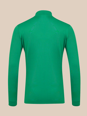 A bright green long-sleeve mock neck shirt shown from the back, displayed on a solid beige background.
