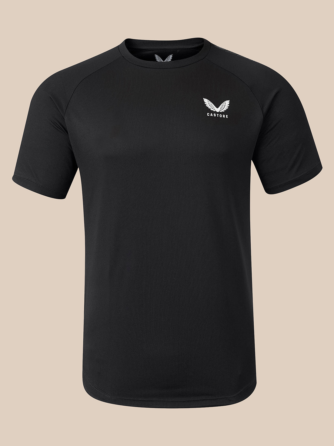 A black short-sleeve athletic t-shirt with a small white wing logo and the word 'CASTORE' on the left chest, displayed on a neutral beige background.